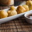 Savory fritters served with tamarind chutney